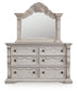 Bruchandi King Upholstered Panel Bed with Mirrored Dresser